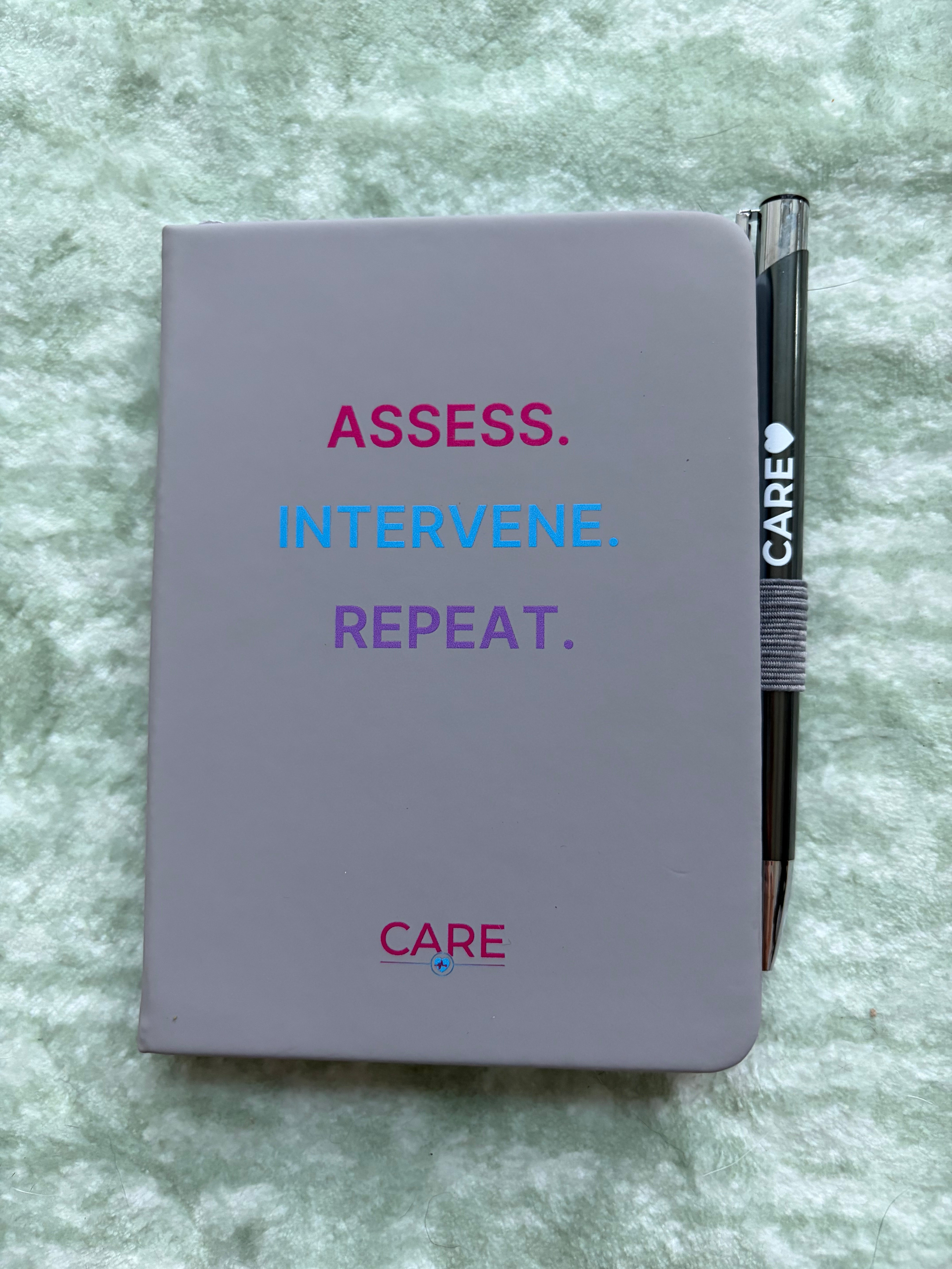 Assess, Intervene, Repeat. Medical Pocket Notebook with Care Pen